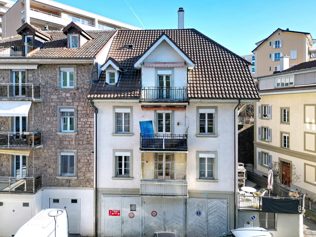 Charming three-apartment building in the city centre of Fribourg