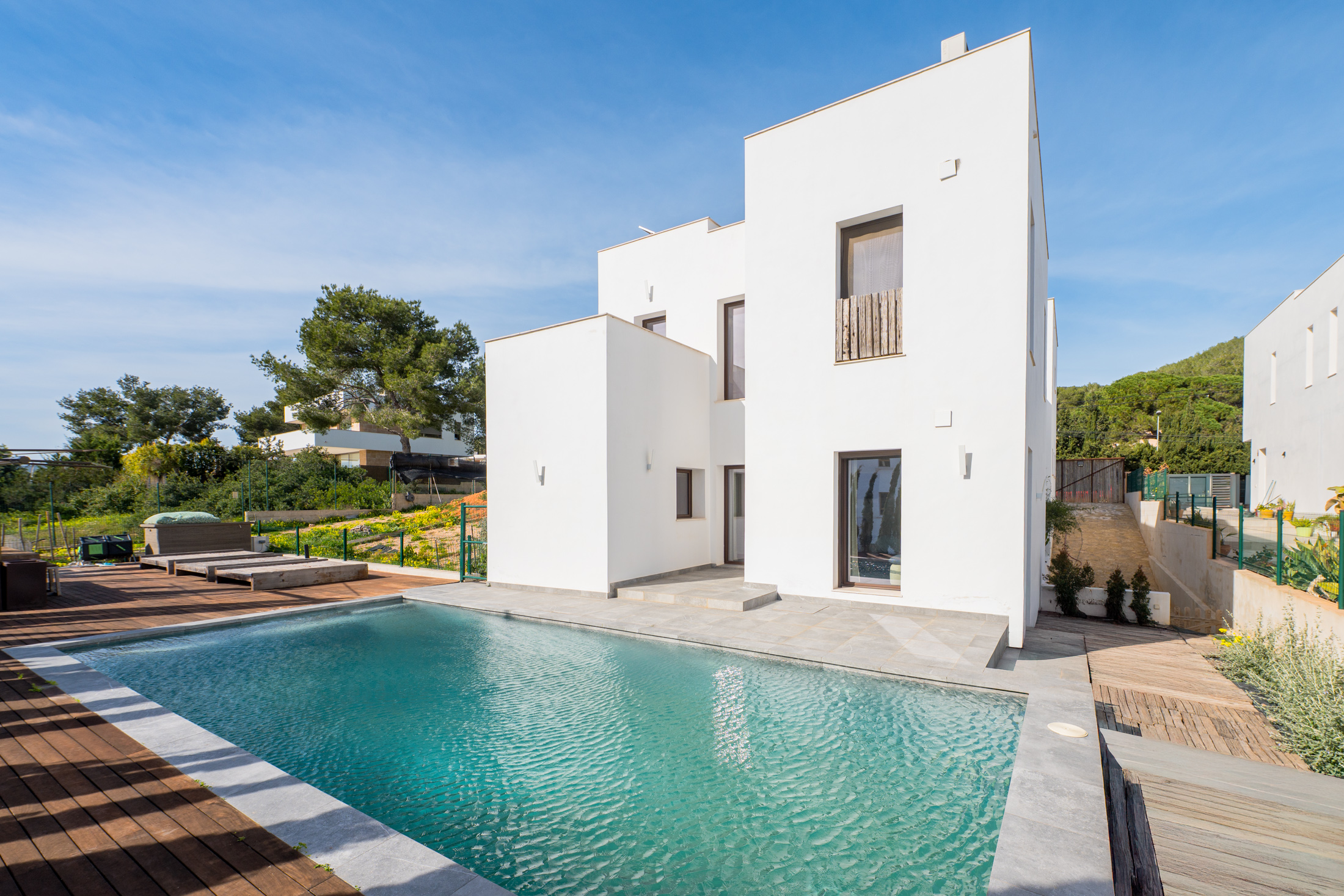 Unique opportunity: elegant modern villa with pool and building plot in Santa Eulalia