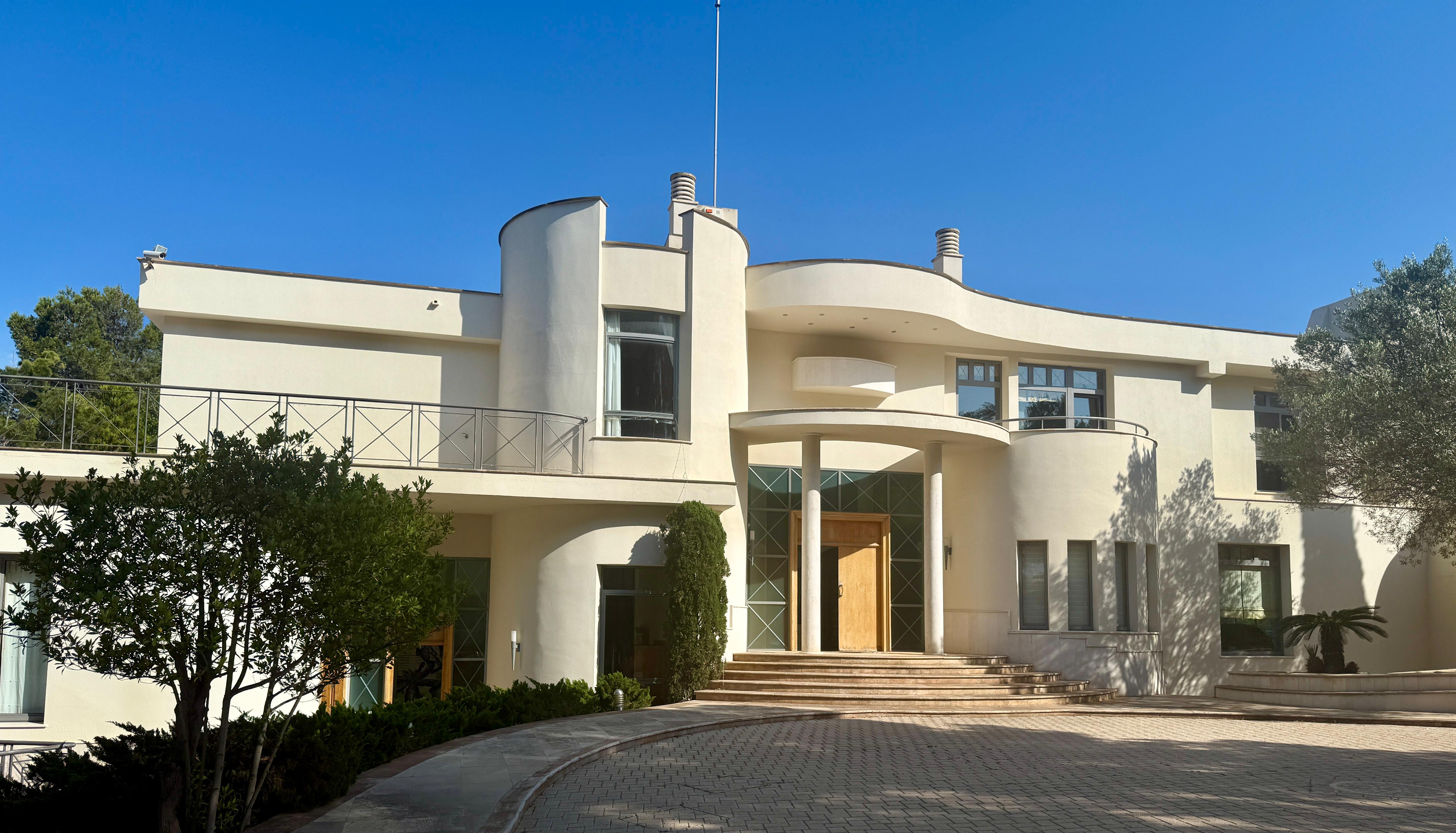 Mediterranean Luxury & Style: Villa with Interior Tree, Two Pools and Marble in Architectural Harmony