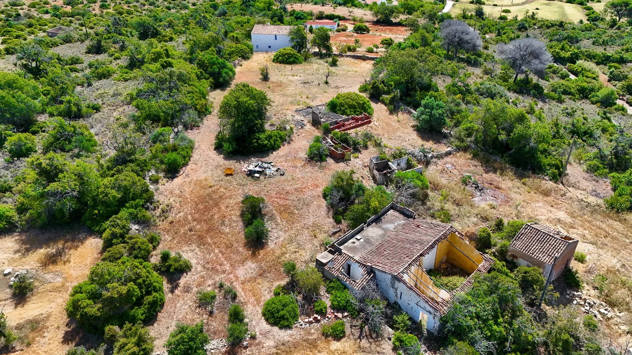 LAND WITH RUINS NEAR THE COAST