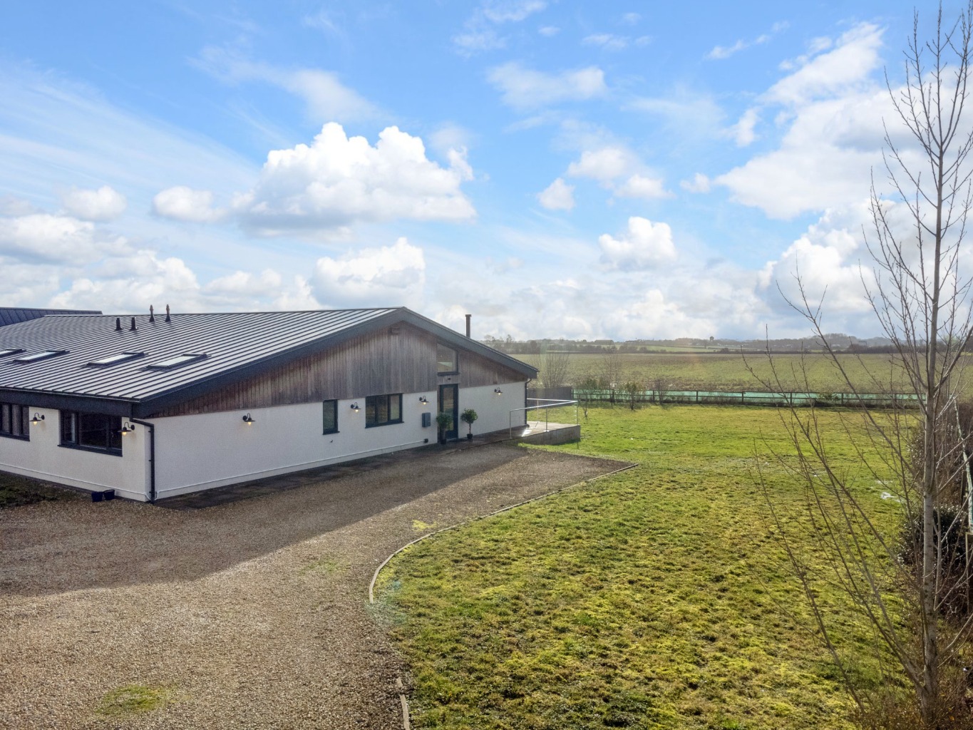 Discover this stunning four-bedroom, three-bathroom semi-rural character home set within 0.5 acres, enjoying countryside view