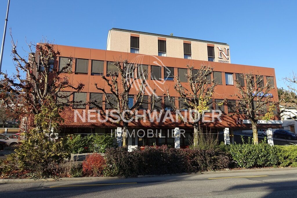 Located in the heart of Delémont, magnificent mixed-use building