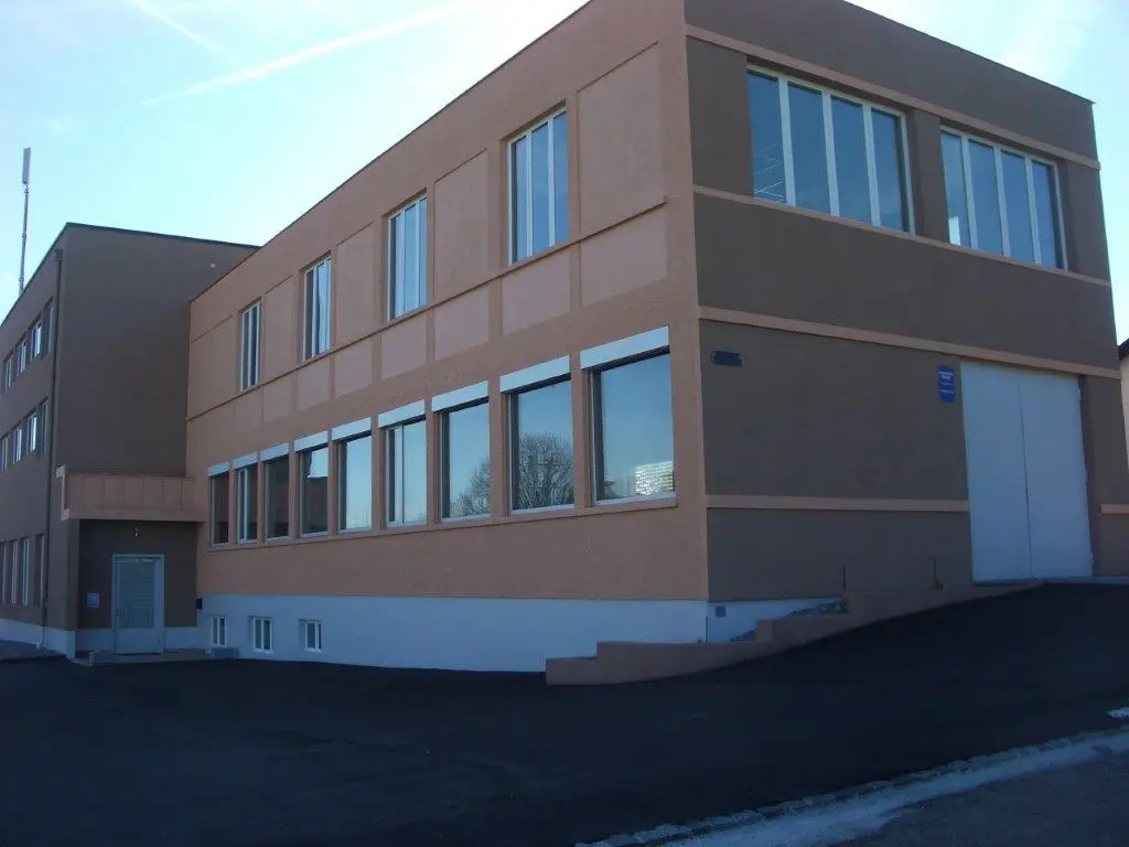 Commercial Building with 2 Apartments for Sale in Courfaivre Switzerland