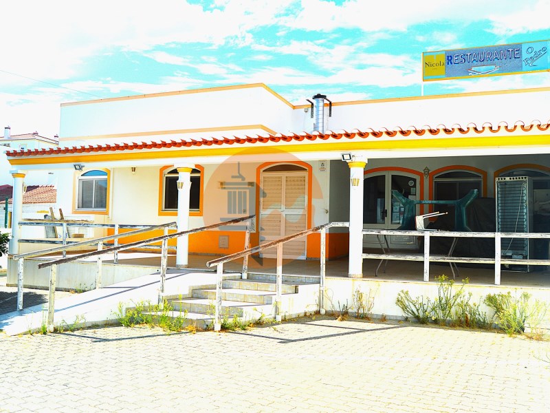 Building with restaurant and apartment.