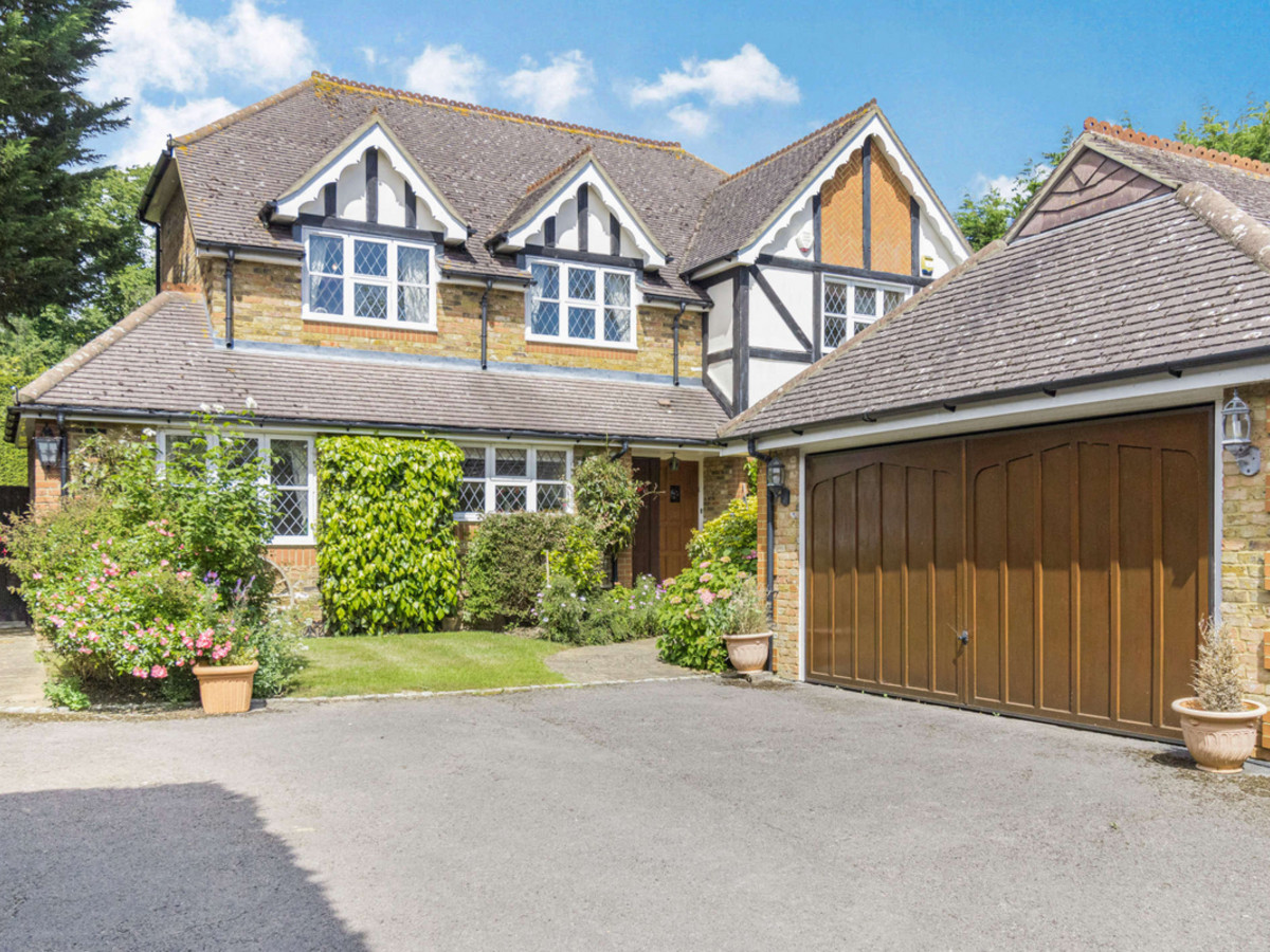 A substantial family home set behind private gated access, this impressive residence offers five generous bedrooms and three