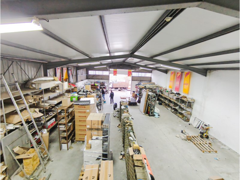 Warehouse with a license for trade/services and industrial activities.