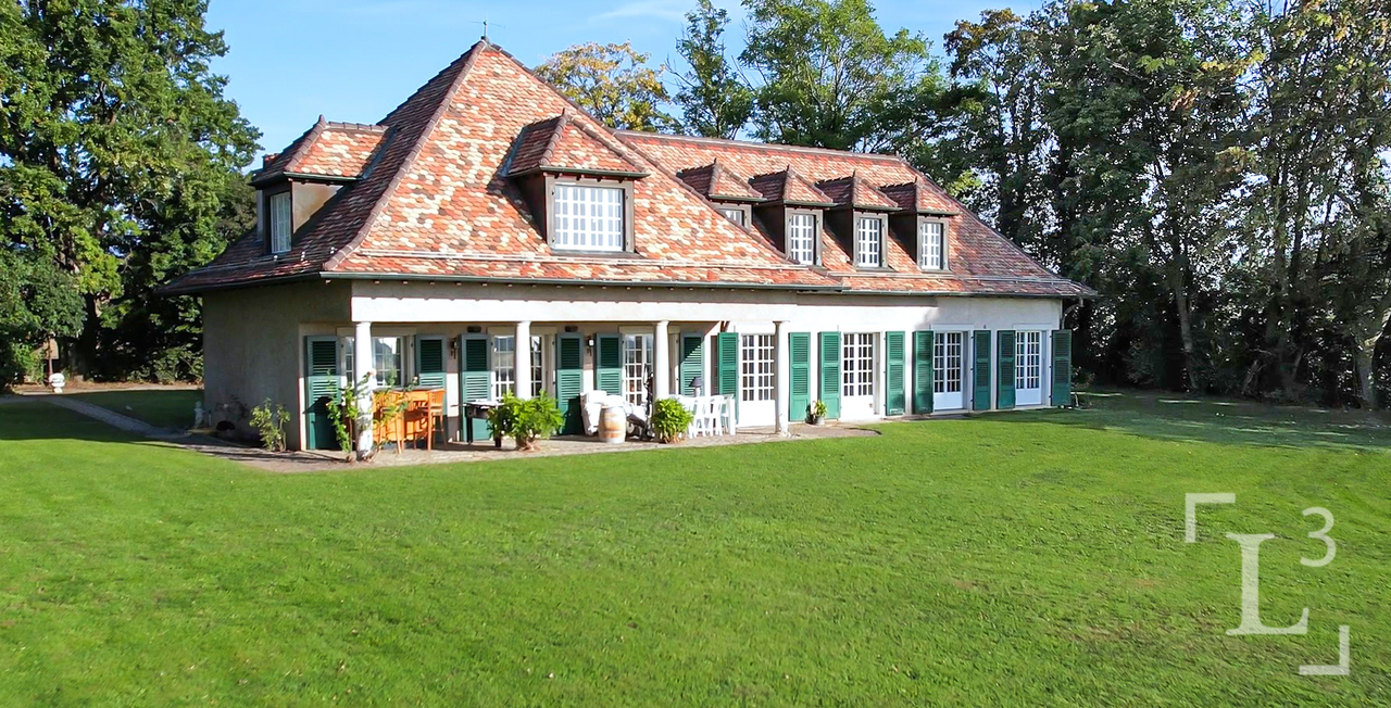 Character property with extensive garden and lake views