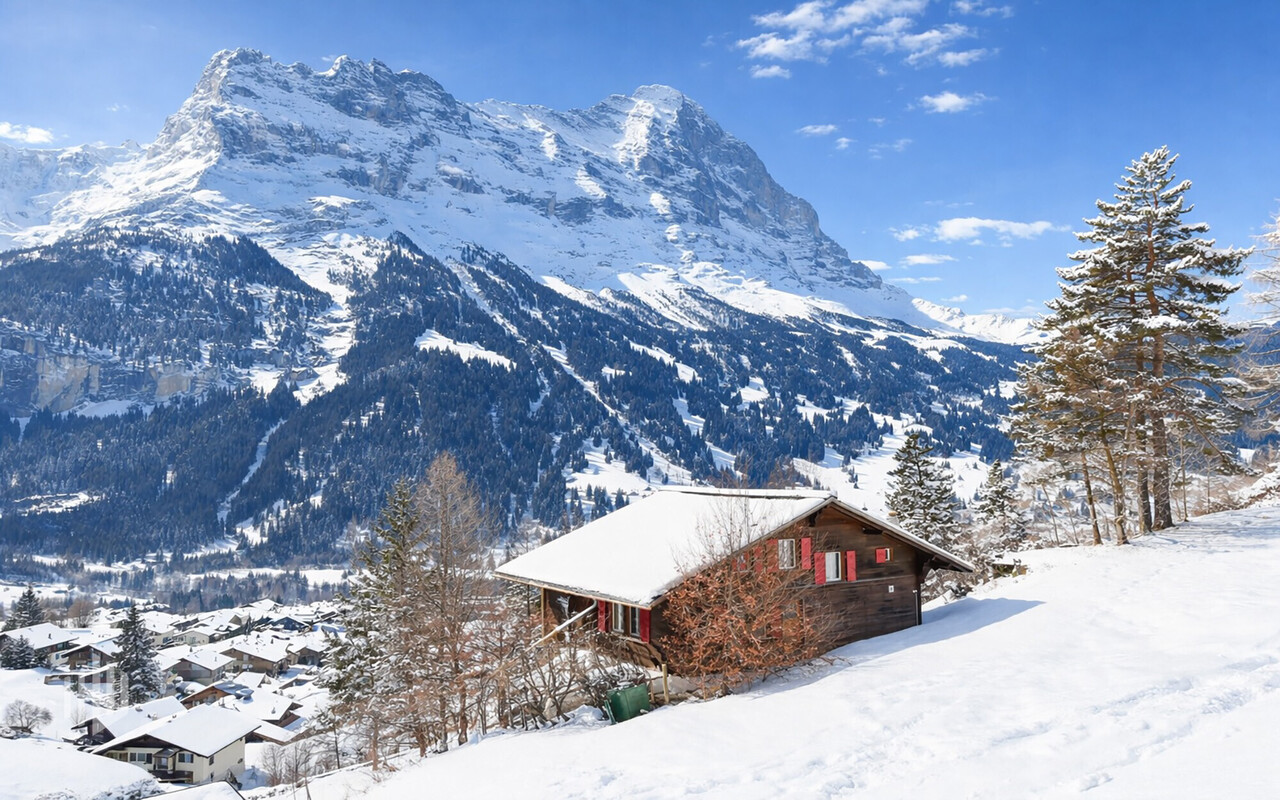 ImmoWyss - Two-family chalet with Eiger view on the sunny side