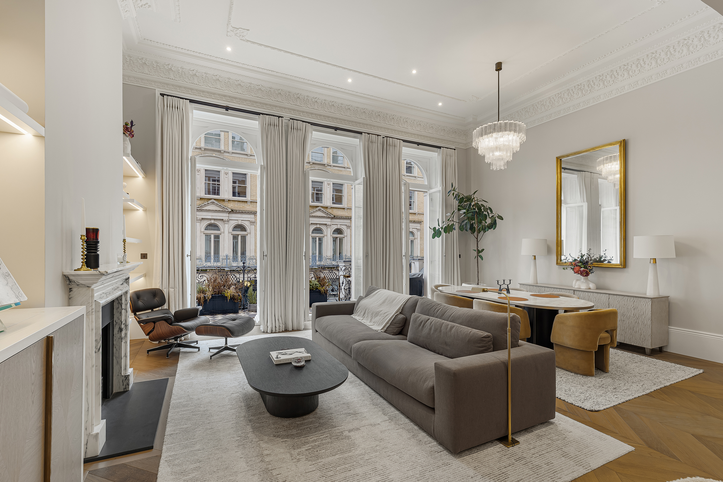 A newly refurbished three-bedroom duplex apartment with balcony on De Vere Garde