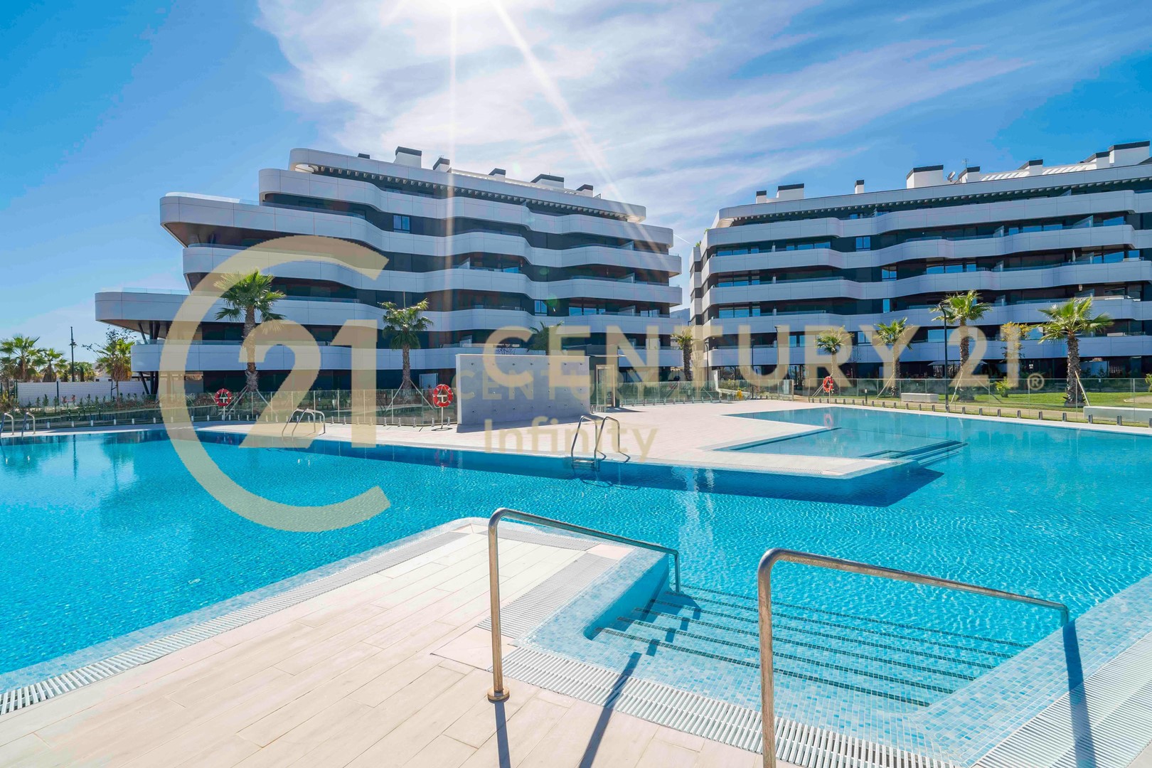 Luxury Beachfront Condo with Panoramic Views in Gated Community