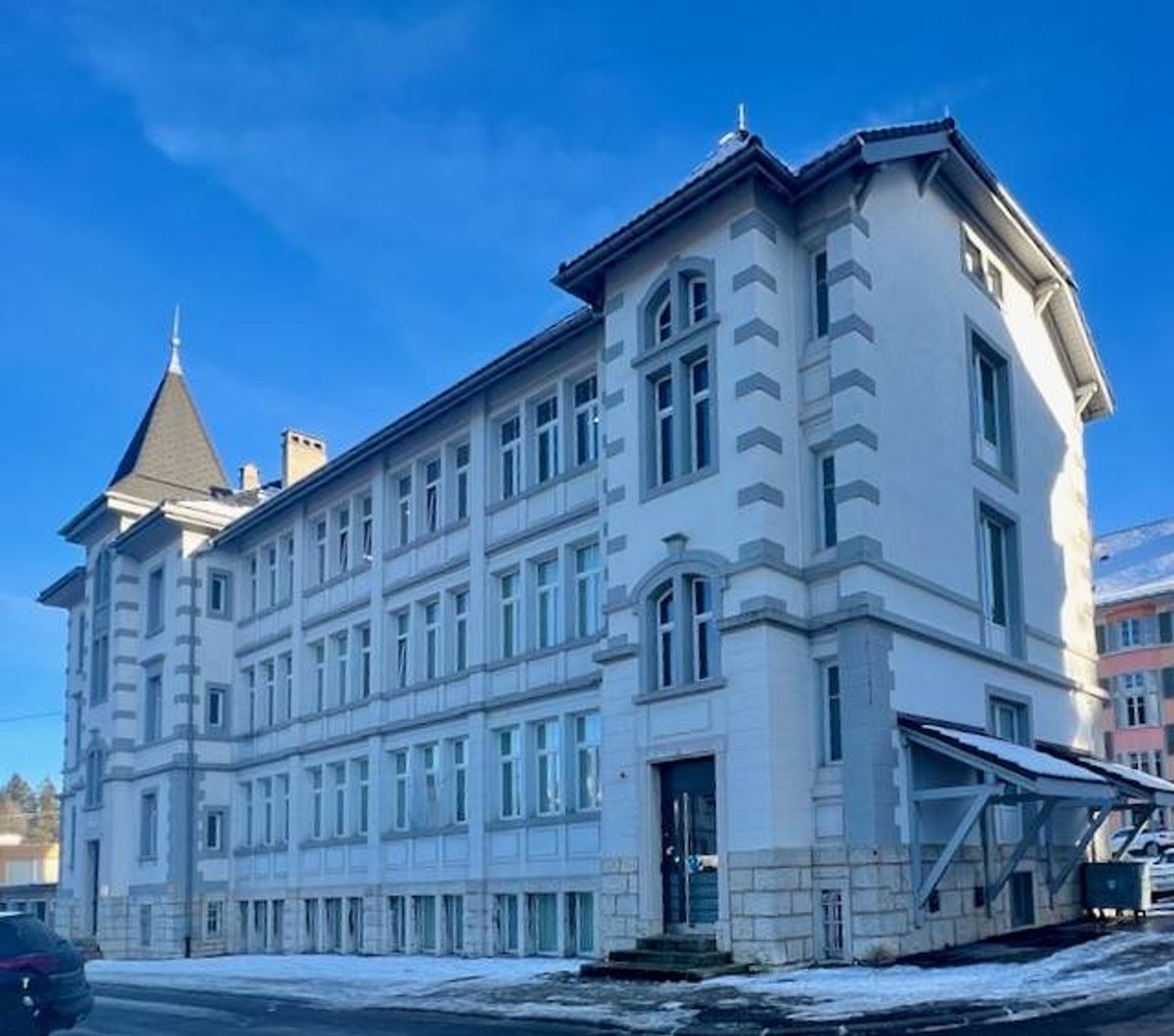 Make an offer for this beautiful mixed-use building, with 14 garages and 18 parking spaces