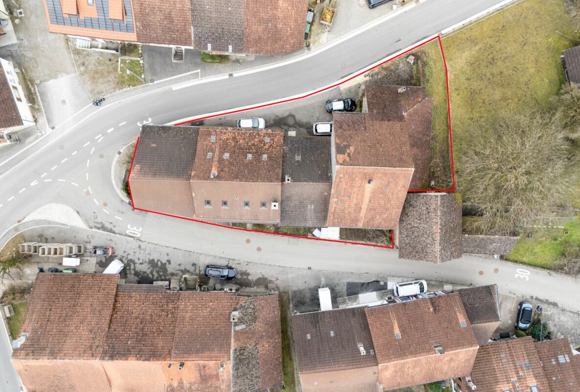 High-potential farmhouse with three residential units and barn