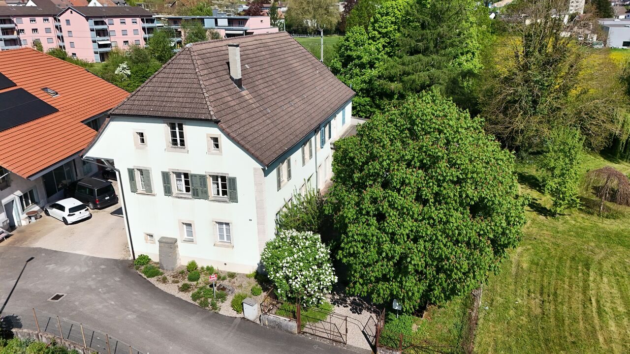 Small building of 2 apartments for sale in the town of Porrentruy