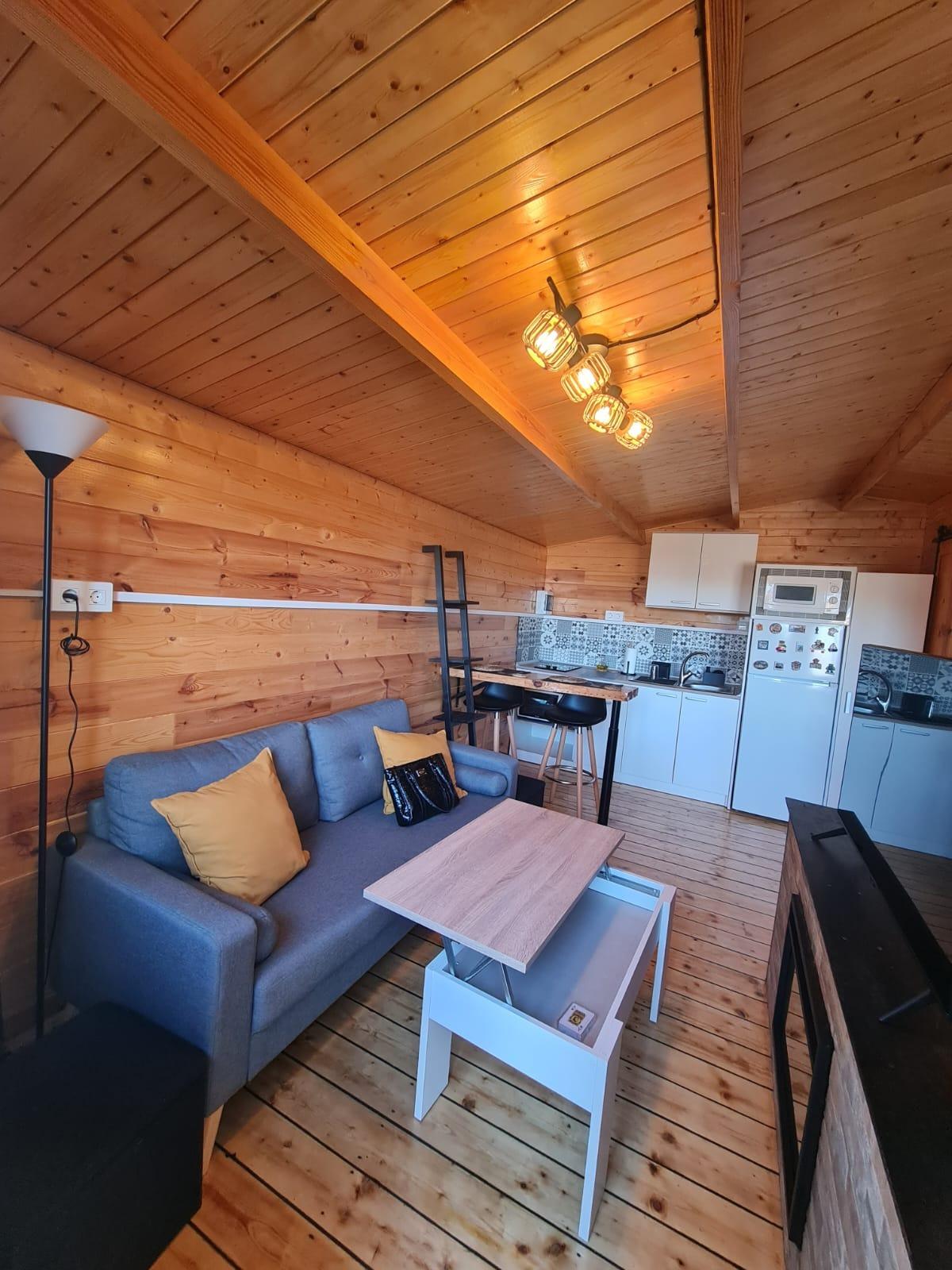 Plot with a wooden house in Cumbres Verdes.