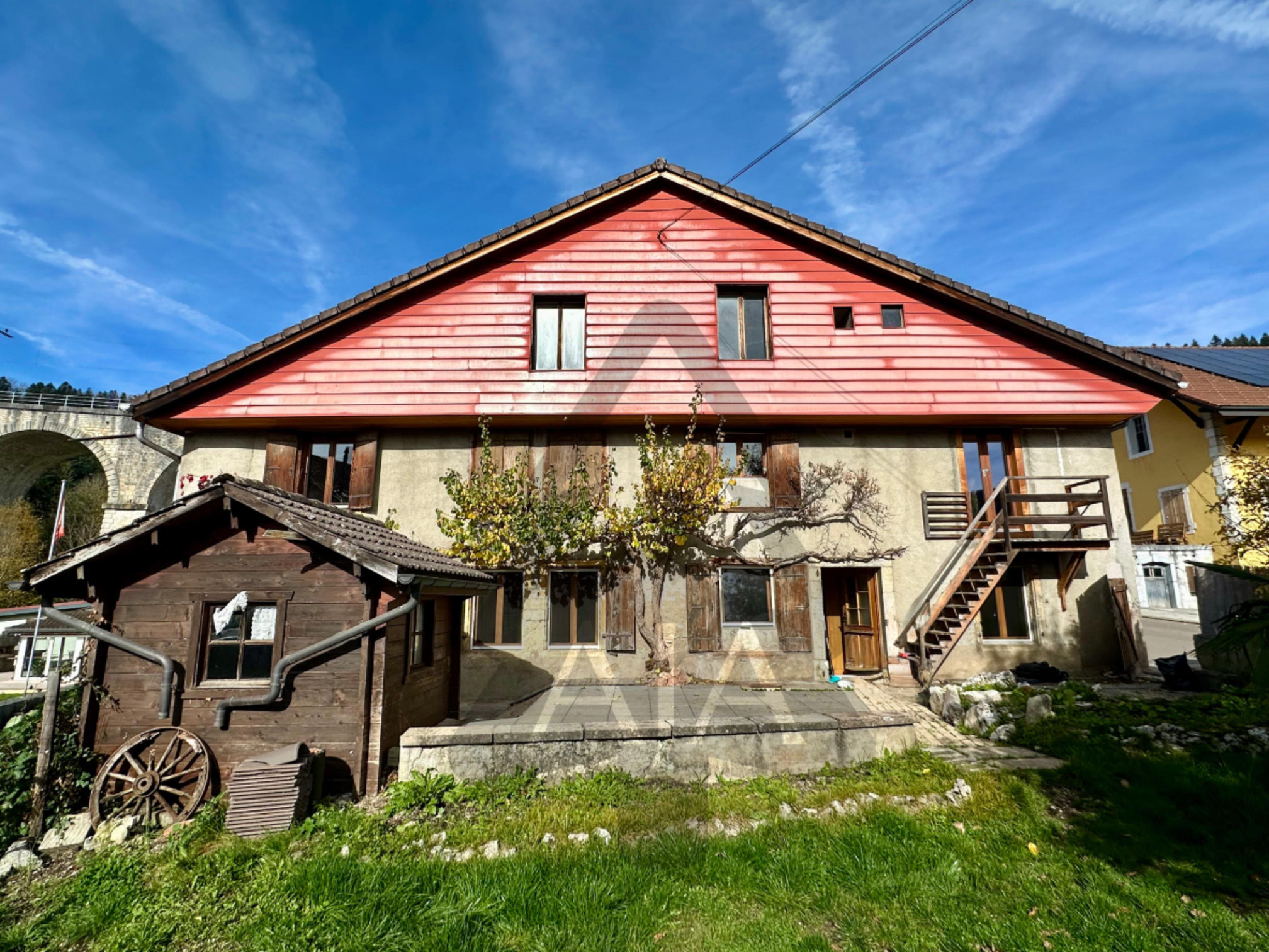 Couvet, beautiful family house of 4 apartments with gardens and terraces in the Centre-North of the Village